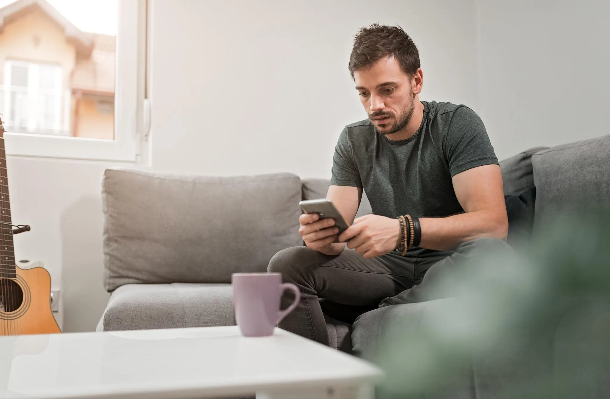 Man booking home spa on phone